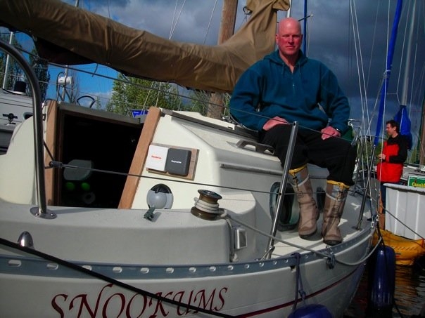 The man and his boat. 